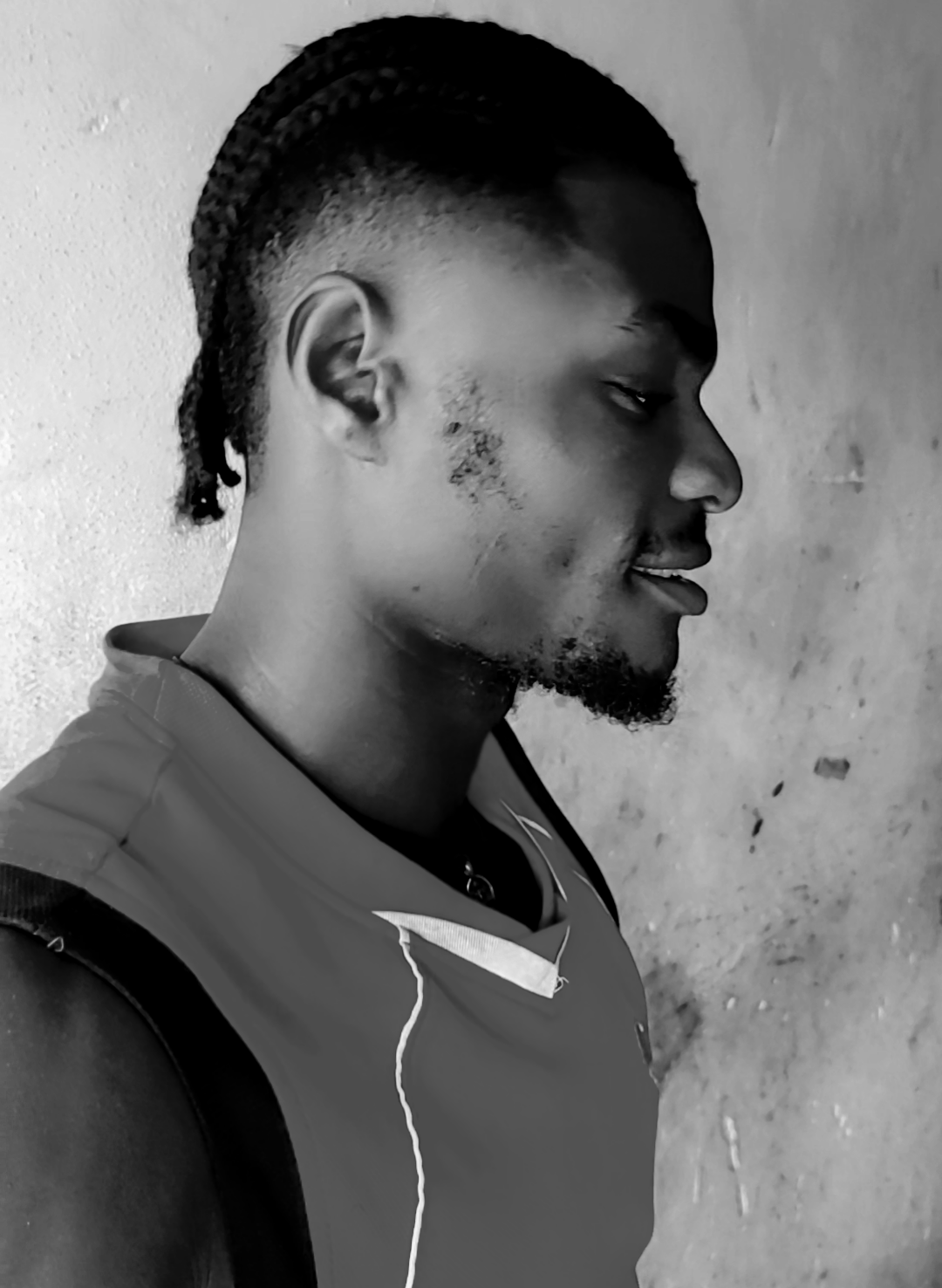 victor Milamulo Lukumbu hairstyle